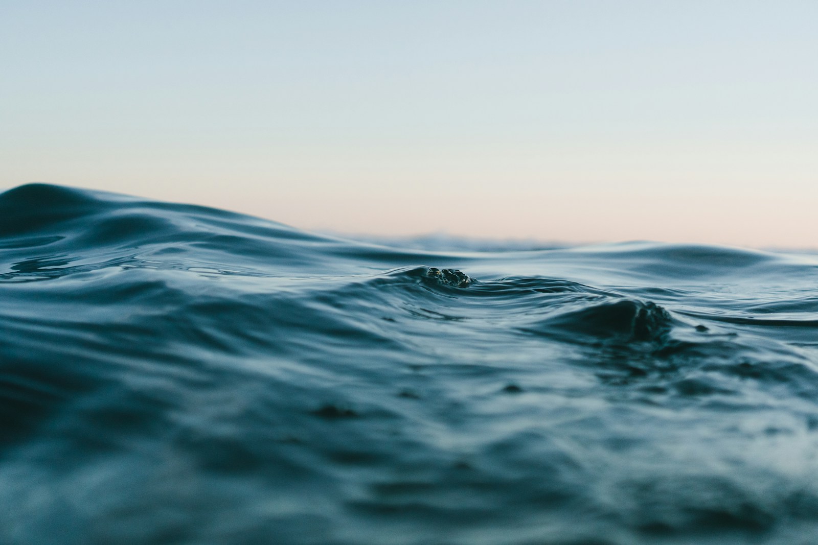 Deep blue ocean wave curling